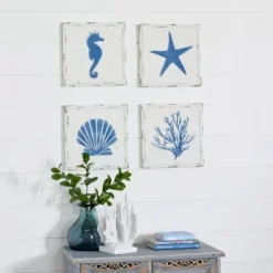 Set Of 4 Metal Sea Horse Speckled Wall Decors With Starfish Shell And Coral Designs Cream - Olivia & May -Home Decoration Series GUEST 224fcb19 35d1 42ea a972 f7e9e12e0abb