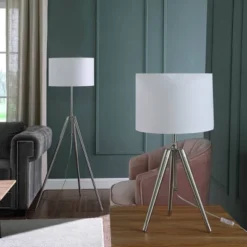 64" X 47" Mid-Century Adjustable Tripod Metal Floor Lamp Chrome/Silver - Ore International -Home Decoration Series GUEST 77f2544f 6b0f 4c94 8708 e652e6cb0212